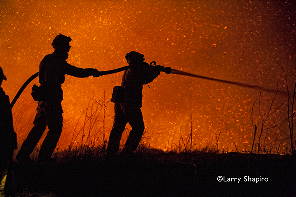 To flash or not to flash silhouette of firemen silhouette of wild land firefighters