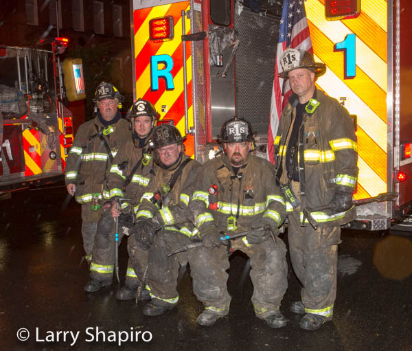 DCFD Rescue 1 firemen after fighting a fire