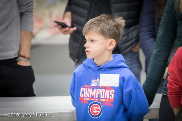 young volunteer at Thanksgiving dinner