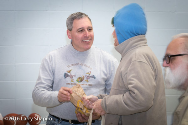 volunteer assists others on Thanksgiving