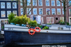 House boa in Amsterdam with laundry hanging and a mannequin
